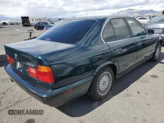 ✅ 1993 BMW 5 Series • VIN: WBAHD6316PBJ92437 • Lot: 47665945. Listed on Copart with 191,001 mi. Free auction sales archive from the USA and detailed vehicle history report at DreamBid. Image 3.