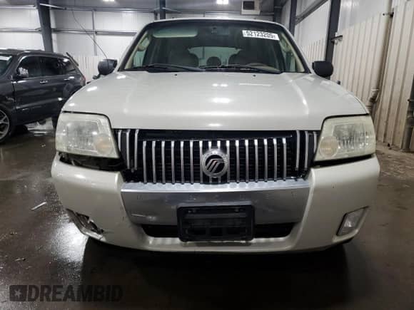 2007 Mercury Mariner Premier с VIN 4M2CU97127KJ20010, выставлен на аукционе Copart как лот 52123205 с пробегом 162 337 миль миль и Списание • Salvage title. История ставок и продаж доступна на DreamBid. Изображение 5.