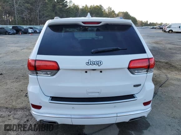 ✅ 2015 Jeep Grand Cherokee Summit • VIN: 1C4RJEJG0FC118974 • Lot: 49002165. Listed on Copart with 112,463 mi. Free auction sales archive from the USA and detailed vehicle history report at DreamBid. Image 6.