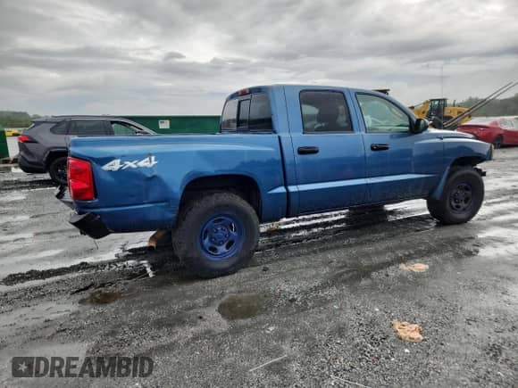 2005 Dodge Dakota ST с VIN 1D7HW28K45S236624, выставлен на аукционе Copart как лот 68104745 с пробегом 251 431 миль миль и Списание • Salvage title. История ставок и продаж доступна на DreamBid. Изображение 3.