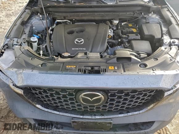 ✅ 2023 Mazda CX-5 S Preferred • VIN: JM3KFBCM9P0125954 • Lot: 94697375. Listed on Copart with 60,390 mi. Free auction sales archive from the USA and detailed vehicle history report at DreamBid. Image 12.