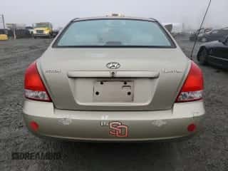 2003 Hyundai Elantra GLS z VIN KMHDN45D93U675358, wystawiony jako Copart lot #84735654 z przebiegiem 119 018 mil mil oraz Czysty tytuł • Clean title. Historia ofert i sprzedaży dostępna na DreamBid. Obrazek 6.