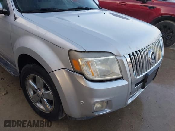 ✅ 2011 Mercury Mariner Premier • VIN: 4M2CN8HG6BKJ03195 • Lot: 42844098. Listed on IAAI with 265,726 mi. Free auction sales archive from the USA and detailed vehicle history report at DreamBid. Image 12.