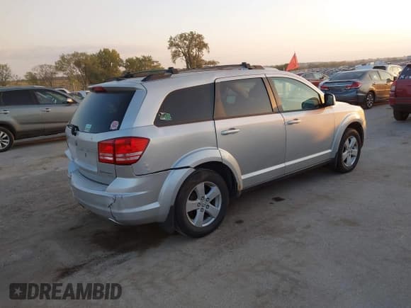 ✅ 2010 Dodge Journey SXT • VIN: 3D4PG5FV3AT138116 • Лот: 43317373. Опубликован ранее на IAAI с пробегом 183 493 миль. Бесплатный доступ к архиву аукционных продаж из США и подробный отчёт об истории автомобиля на DreamBid. Изображение 4.