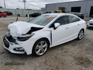 ✅ 2017 Chevrolet Cruze Premier • VIN: 1G1BF5SMXH7196917 • Lot: 46760013. Listed on Copart with 69,089 mi. Free auction sales archive from the USA and detailed vehicle history report at DreamBid. Image 1.