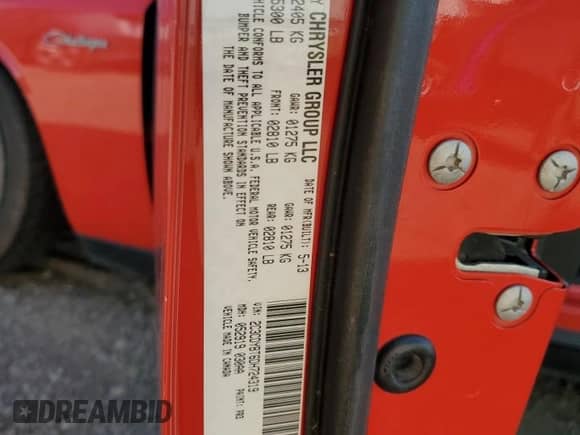 2013 Dodge Challenger R/T Plus z VIN 2C3CDYBT6DH724319, wystawiony jako Copart lot #75309524 z przebiegiem 88 325 mil mil oraz Szkoda całkowita • Salvage title. Historia ofert i sprzedaży dostępna na DreamBid. Obrazek 12.