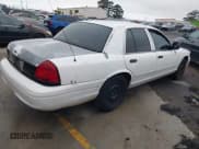 ✅ 2005 Ford Police Interceptor • VIN: 2FAFP71W75X120703 • Lot: 41256222. Listed on IAAI with 208,095 mi. Free auction sales archive from the USA and detailed vehicle history report at DreamBid. Image 4.