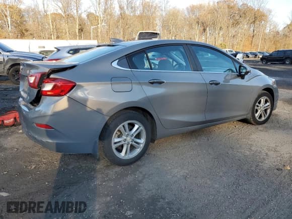 ✅ 2018 Chevrolet Cruze LT • VIN: 1G1BE5SM6J7198950 • Лот: 92197095. Опубликован ранее на Copart с пробегом 104 998 миль. Бесплатный доступ к архиву аукционных продаж из США и подробный отчёт об истории автомобиля на DreamBid. Изображение 3.
