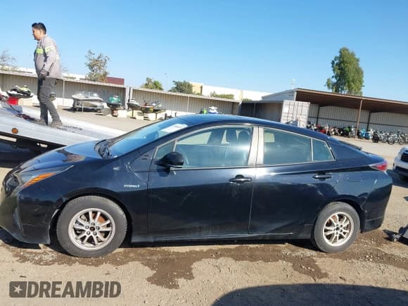 ✅ 2016 Toyota Prius Four • VIN: JTDKARFU5G3010178 • Lot: 43346635. Listed on IAAI with 106,100 mi. Free auction sales archive from the USA and detailed vehicle history report at DreamBid. Image 13.