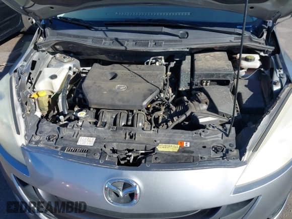 ✅ 2013 Mazda 5 Touring • VIN: JM1CW2CL2D0160965 • Lot: 43410114. Listed on IAAI with 107,043 mi. Free auction sales archive from the USA and detailed vehicle history report at DreamBid. Image 10.