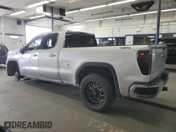 ✅ 2021 GMC Sierra 1500 SLE • VIN: 1GTR9BED8MZ236210 • Лот: 56898185. Опубликован ранее на Copart с пробегом 128 697 миль. Бесплатный доступ к архиву аукционных продаж из США и подробный отчёт об истории автомобиля на DreamBid. Изображение 2.