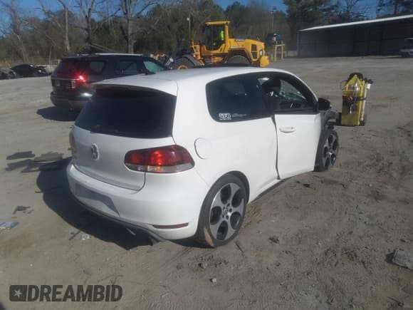 ✅ 2012 Volkswagen Golf GTI w/Conv & Sunroof • VIN: WVWEV7AJ5CW094384 • Lot: 41744860. Listed on IAAI with 157,285 mi. Free auction sales archive from the USA and detailed vehicle history report at DreamBid. Image 4.