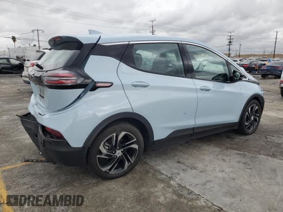 ✅ 2023 Chevrolet Bolt EV 2LT • VIN: 1G1FX6S04P4187003 • Lot: 93295265. Listed on Copart with 21,909 mi. Free auction sales archive from the USA and detailed vehicle history report at DreamBid. Image 3.