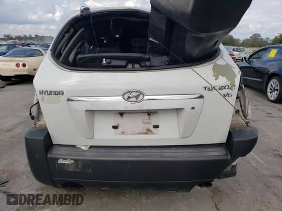 2007 Hyundai Tucson SE z VIN KM8JN12D77U631936, wystawiony jako Copart lot #73981684 z przebiegiem Nie podano mil oraz Nie do naprawy • Non repairable. Historia ofert i sprzedaży dostępna na DreamBid. Obrazek 6.