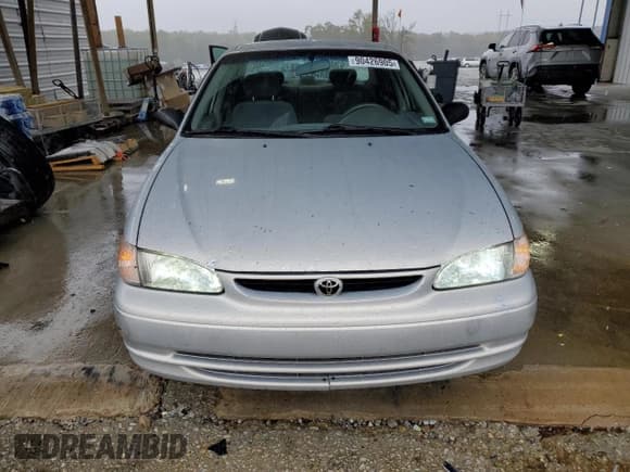 ✅ 2000 Toyota Corolla CE • VIN: 1NXBR12EXYZ396578 • Lot: 90426905. Listed on Copart with 232,479 mi. Free auction sales archive from the USA and detailed vehicle history report at DreamBid. Image 5.