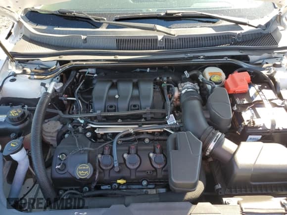 ✅ 2016 Ford Taurus SEL • VIN: 1FAHP2E8XGG126656 • Lot: 91101355. Listed on Copart with 83,804 mi. Free auction sales archive from the USA and detailed vehicle history report at DreamBid. Image 11.