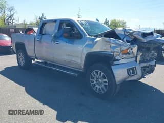 ✅ 2017 GMC Sierra 2500HD Denali • VIN: 1GT12UEYXHF221974 • Лот: 42184163. Опубликован ранее на IAAI с пробегом Не указан. Бесплатный доступ к архиву аукционных продаж из США и подробный отчёт об истории автомобиля на DreamBid. Изображение 1.