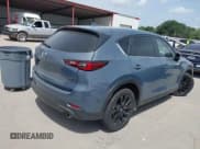 ✅ 2023 Mazda CX-5 S Carbon Edition • VIN: JM3KFBCMXP0136901 • Lot: 42630209. Listed on IAAI with 22,519 mi. Free auction sales archive from the USA and detailed vehicle history report at DreamBid. Image 4.