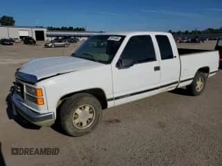 ✅ 1997 GMC Sierra 1500 • VIN: 1GTEC19M1VE515043 • Лот: 73141404. Размещён на Copart с пробегом 294 455 миль миль. Получите бесплатный доступ к архиву аукционных продаж из США и посмотрите подробный отчёт об истории автомобиля на DreamBid. Изображение 1.