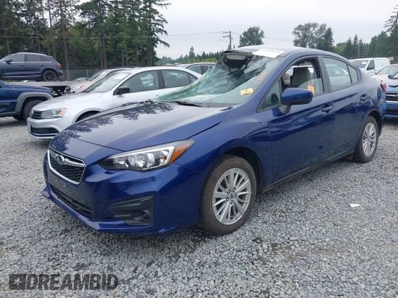 ✅ 2017 Subaru Impreza Premium • VIN: 4S3GKAB67H3622590 • Lot: 43090070. Listed on IAAI with 74,876 mi. Free auction sales archive from the USA and detailed vehicle history report at DreamBid. Image 2.