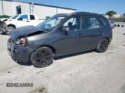 ✅ 2007 Kia Rondo LX • VIN: KNAFG525X77073080 • Lot: 85082355. Listed on Copart with 133,484 mi. Free auction sales archive from the USA and detailed vehicle history report at DreamBid. Image 1.