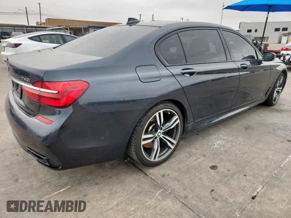 ✅ 2017 BMW 7 Series 740i • VIN: WBA7E2C34HG740975 • Lot: 71019405. Listed on Copart with 90,805 mi. Free auction sales archive from the USA and detailed vehicle history report at DreamBid. Image 3.