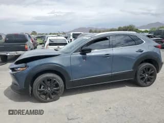 ✅ 2021 Mazda CX-30 Premium • VIN: 3MVDMBDY6MM260048 • Lot: 53749295. Listed on Copart with 48,397 mi. Free auction sales archive from the USA and detailed vehicle history report at DreamBid. Image 1.