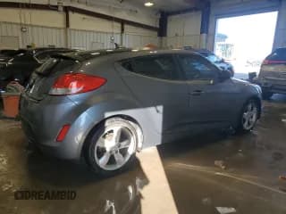 ✅ 2014 Hyundai Veloster • VIN: KMHTC6AD4EU206684 • Lot: 78092774. Wystawiony na Copart z przebiegiem 148 654 mil. Bezpłatny archiwum sprzedaży aukcyjnych z USA i szczegółowy raport historii pojazdu na DreamBid. Zdjęcie 3.