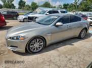 ✅ 2013 Jaguar XF RWD • VIN: SAJWA0E79D8S95654 • Lot: 64668775. Listed on Copart with 148,413 mi. Free auction sales archive from the USA and detailed vehicle history report at DreamBid. Image 1.