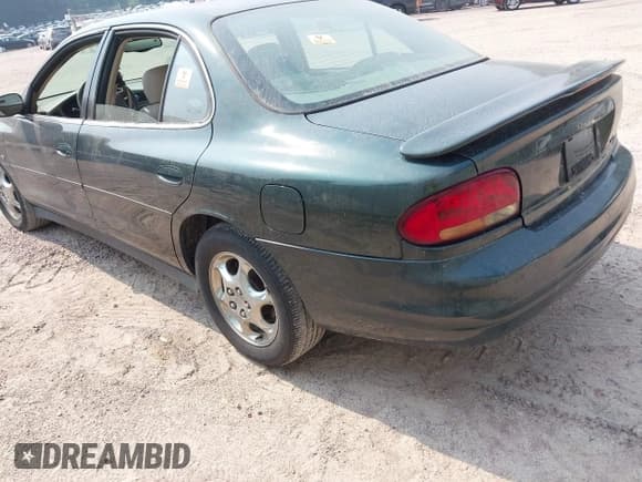 ✅ 1999 Oldsmobile Intrigue GLS • VIN: 1G3WX52H5XF376741 • Lot: 42878129. Listed on IAAI with 119,959 mi. Free auction sales archive from the USA and detailed vehicle history report at DreamBid. Image 3.