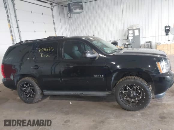 ✅ 2014 Chevrolet Tahoe LT • VIN: 1GNSCBE07ER249202 • Lot: 42546283. Listed on IAAI with 124,538 mi. Free auction sales archive from the USA and detailed vehicle history report at DreamBid. Image 14.