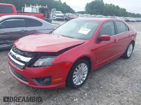 ✅ 2011 Ford Fusion Hybrid • VIN: 3FADP0L39BR308022 • Lot: 42351594. Listed on IAAI with 166,294 mi. Free auction sales archive from the USA and detailed vehicle history report at DreamBid. Image 19.
