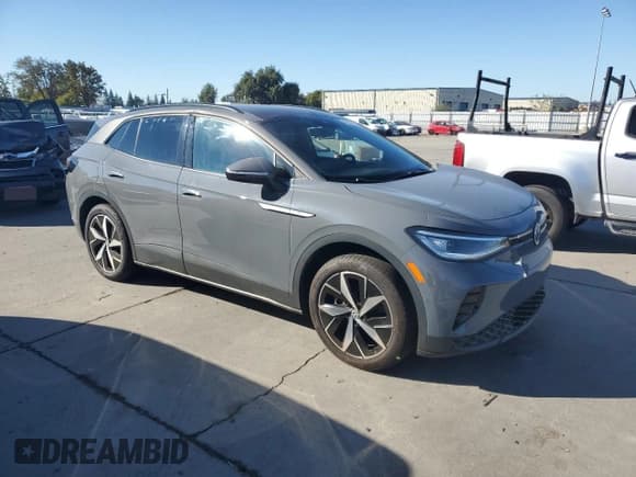 ✅ 2023 Volkswagen ID.4 S • VIN: 1V25MPE80PC019818 • Lot: 90223675. Listed on Copart with 116,120 mi. Free auction sales archive from the USA and detailed vehicle history report at DreamBid. Image 4.