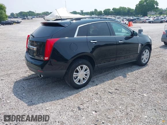 ✅ 2016 Cadillac SRX • VIN: 3GYFNAE33GS574870 • Lot: 42414146. Listed on IAAI with 103,280 mi. Free auction sales archive from the USA and detailed vehicle history report at DreamBid. Image 4.