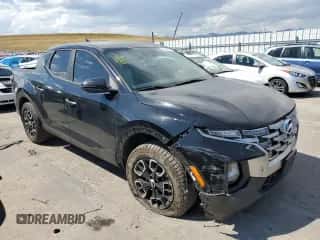 2022 Hyundai Santa Cruz SEL z VIN 5NTJBDAE6NH020958, wystawiony jako Copart lot #71040394 z przebiegiem 35 809 mil mil oraz Szkoda całkowita • Salvage title. Historia ofert i sprzedaży dostępna na DreamBid. Obrazek 4.