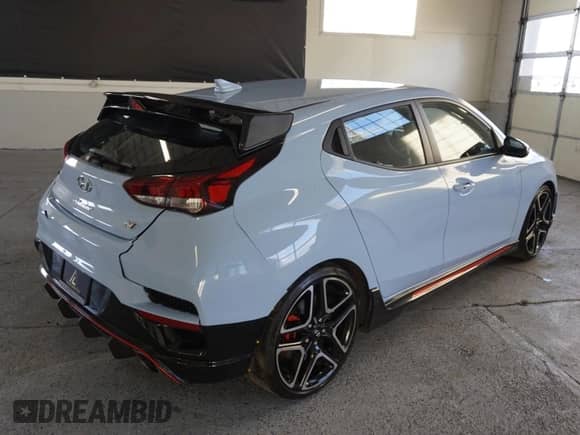 2021 Hyundai Veloster z VIN KMHT36AH6MU009517, wystawiony jako Copart lot #80048374 z przebiegiem 19 149 mil mil oraz Szkoda całkowita • Salvage title. Historia ofert i sprzedaży dostępna na DreamBid. Obrazek 3.