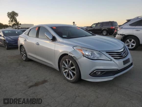 2016 Hyundai Azera z VIN KMHFG4JG4GA563397, wystawiony jako Copart lot #87879325 z przebiegiem 58 528 mil mil oraz Szkoda całkowita • Salvage title. Historia ofert i sprzedaży dostępna na DreamBid. Obrazek 4.