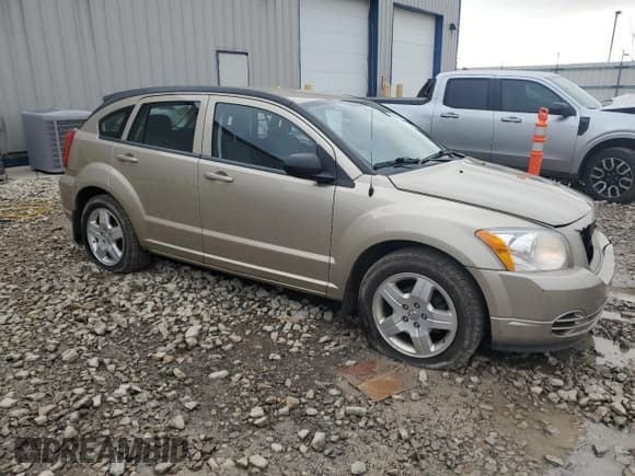 ✅ 2009 Dodge Caliber SXT • VIN: 1B3HB48AX9D259703 • Лот: 80551064. Опубликован ранее на Copart с пробегом 128 818 миль. Бесплатный доступ к архиву аукционных продаж из США и подробный отчёт об истории автомобиля на DreamBid. Изображение 4.