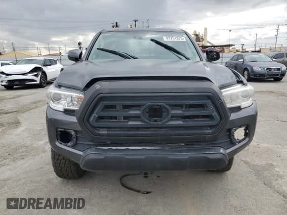 ✅ 2022 Toyota Tacoma SR • VIN: 3TYSX5EN8NT016817 • Лот: 93751975. Опубликован ранее на Copart с пробегом 52 825 миль. Бесплатный доступ к архиву аукционных продаж из США и подробный отчёт об истории автомобиля на DreamBid. Изображение 5.