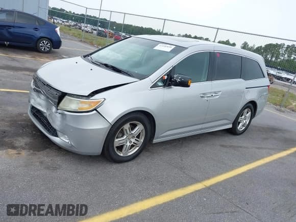 ✅ 2012 Honda Odyssey Touring • VIN: 5FNRL5H93CB122128 • Лот: 42206838. Опубликован ранее на IAAI с пробегом 181 605 миль. Бесплатный доступ к архиву аукционных продаж из США и подробный отчёт об истории автомобиля на DreamBid. Изображение 2.