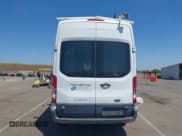 ✅ 2015 Ford Transit Cargo • VIN: 1FTNR2XM9FKA18848 • Lot: 42218203. Listed on IAAI with 162,184 mi. Free auction sales archive from the USA and detailed vehicle history report at DreamBid. Image 17.