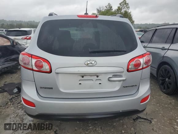 ✅ 2010 Hyundai Santa Fe GLS • VIN: 5NMSG3AB0AH378732 • Lot: 73220904. Listed on Copart with 127,558 mi. Free auction sales archive from the USA and detailed vehicle history report at DreamBid. Image 6.