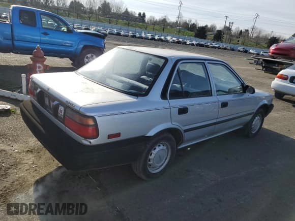 ✅ 1990 Toyota Corolla • VIN: JT2AE94A1L3375095 • Lot: 41892305. Wystawiony na Copart z przebiegiem 182 429 mil. Bezpłatny archiwum sprzedaży aukcyjnych z USA i szczegółowy raport historii pojazdu na DreamBid. Zdjęcie 3.