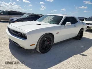 ✅ 2012 Dodge Challenger SRT-8 392 • VIN: 2C3CDYCJ7CH275275 • Lot: 77423314. Wystawiony na Copart z przebiegiem 71 896 mil. Bezpłatny archiwum sprzedaży aukcyjnych z USA i szczegółowy raport historii pojazdu na DreamBid. Zdjęcie 1.