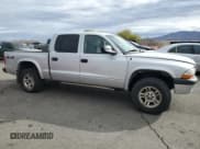 ✅ 2003 Dodge Dakota Sport • VIN: 1D7HG38N23S205026 • Lot: 82214314. Wystawiony na Copart z przebiegiem 194 724 mil. Bezpłatny archiwum sprzedaży aukcyjnych z USA i szczegółowy raport historii pojazdu na DreamBid. Zdjęcie 4.