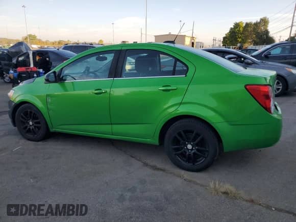 2015 Chevrolet Sonic LT с VIN 1G1JC5SH4F4163398, выставлен на аукционе Copart как лот 71773444 с пробегом 121 909 миль миль и Списание • Salvage title. История ставок и продаж доступна на DreamBid. Изображение 2.