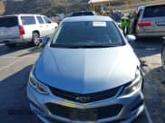 ✅ 2018 Chevrolet Cruze LS • VIN: 1G1BC5SM6J7175707 • Lot: 43652484. Wystawiony na IAAI z przebiegiem 133 689 mil. Bezpłatny archiwum sprzedaży aukcyjnych z USA i szczegółowy raport historii pojazdu na DreamBid. Zdjęcie 12.