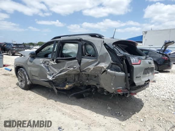 ✅ 2023 Jeep Cherokee Trailhawk • VIN: 1C4PJMBN7PD116214 • Lot: 55080845. Listed on Copart with 14,611 mi. Free auction sales archive from the USA and detailed vehicle history report at DreamBid. Image 2.