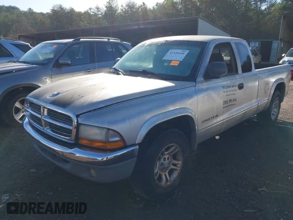 ✅ 2004 Dodge Dakota SLT • VIN: 1D7GL42K94S676958 • Лот: 41326166. Опубликован ранее на IAAI с пробегом 176 886 миль. Бесплатный доступ к архиву аукционных продаж из США и подробный отчёт об истории автомобиля на DreamBid. Изображение 2.