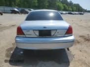 ✅ 2001 Ford Crown Victoria • VIN: 2FAFP73W61X190913 • Lot: 53063475. Listed on Copart with 151,527 mi. Free auction sales archive from the USA and detailed vehicle history report at DreamBid. Image 6.